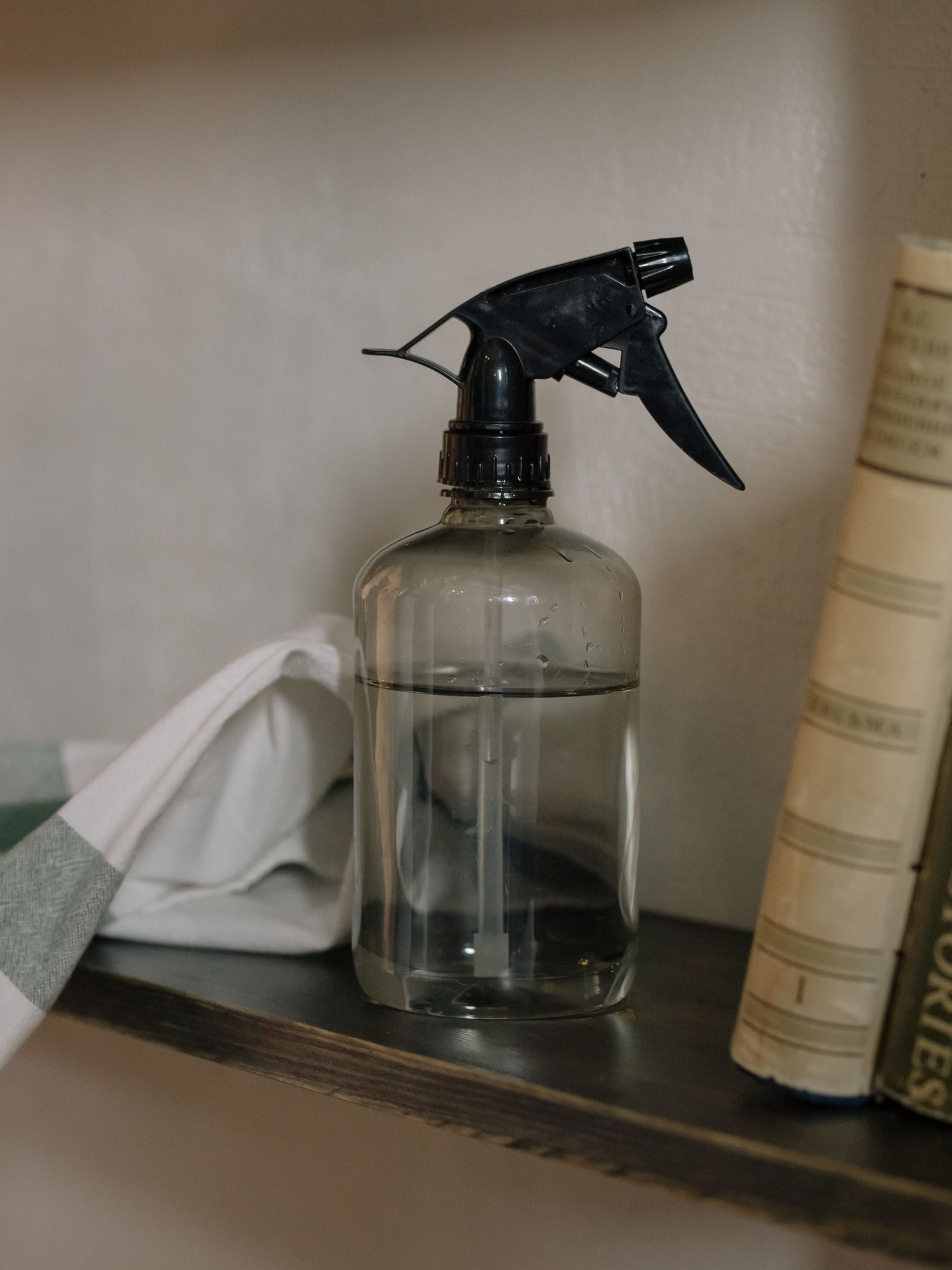 close up of a clear spray bottle