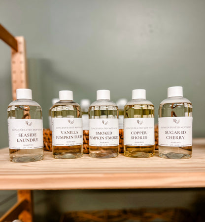5 clear bottles of rayden + grace mop soap
